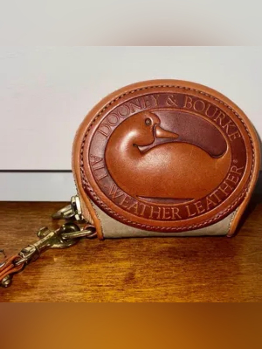 Dooney & Bourke Brown & Tan Embossed Duck Coin Pouch small